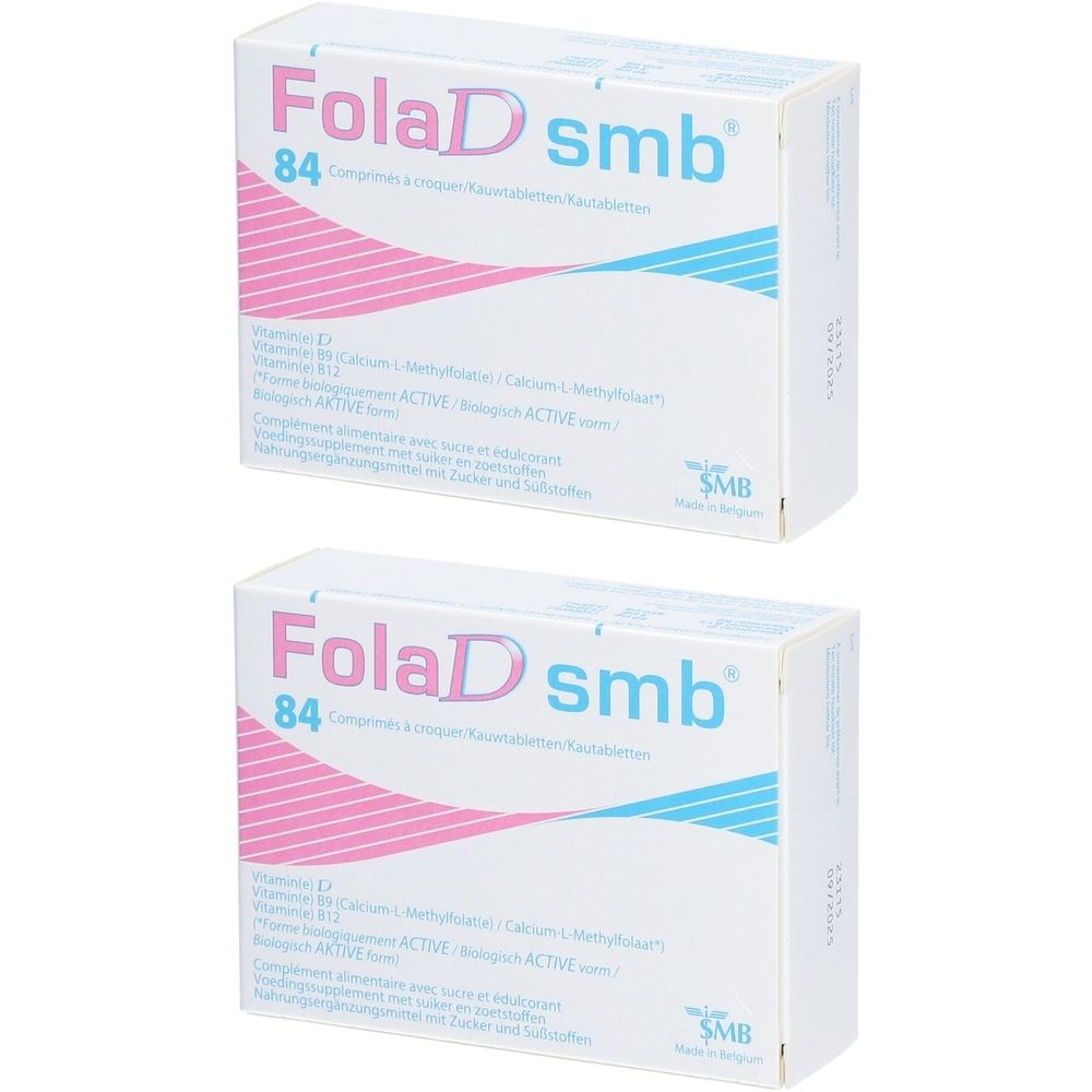 Deux boîtes blanches avec "FolaD smb". Bandes roses et bleues sur le dessus. Texte en plusieurs langues, dont le français.