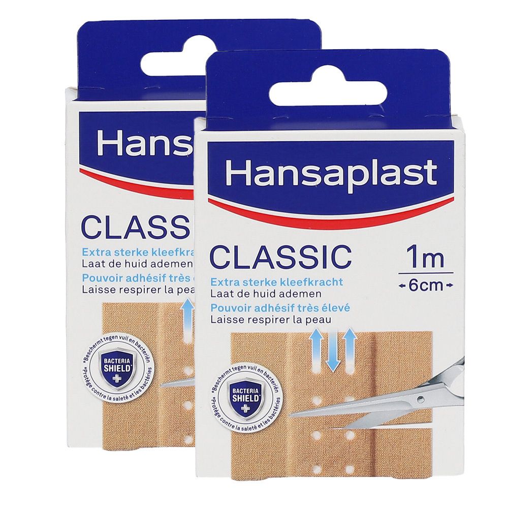 Twee Hansaplast Classic pleisterverpakkingen. Opschrift "CLASSIC", "1m -6cm-". Beige pleisters met gaatjes en schaar.