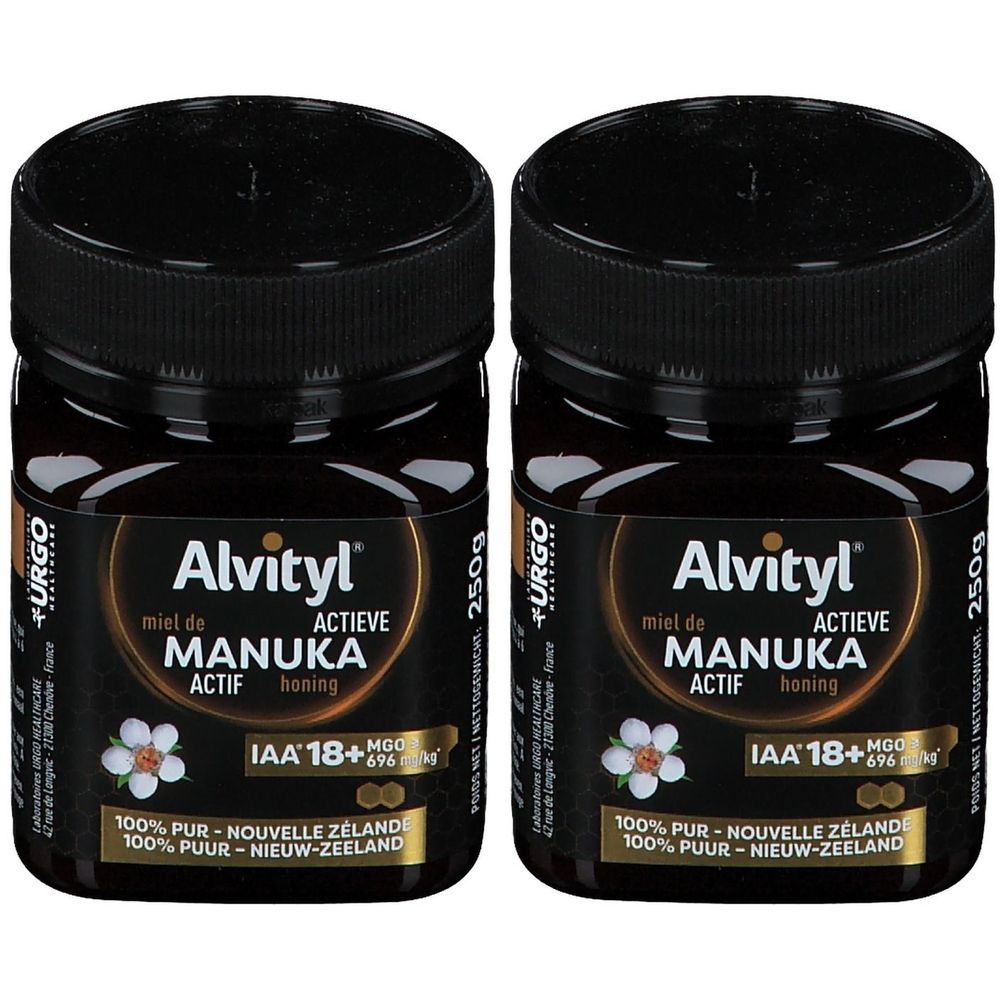 Twee potten honing met zwarte deksels. Etiket "Alvityl Miel de Manuka Actif IAA 18+".