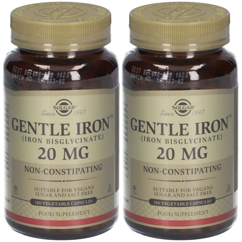 Deux flacons de Solgar Gentle Iron 20 mg. Flacons en verre brun avec bouchon doré. Inscription : Gentle Iron, 20 mg, convient aux végétaliens.