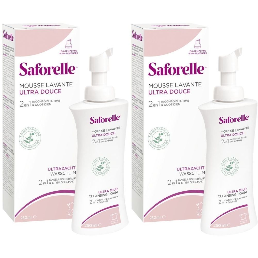 Twee flessen en verpakkingen van Saforelle Mousse Lavante Ultra Douce. Witte flessen met pomp, roze verpakking.