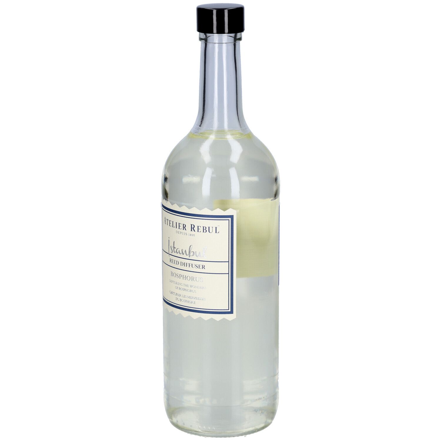 Glasflasche mit schwarzem Deckel und Etikett. Aufschrift: Atelier Rebul, Istanbul Bosphorus, Reed Diffuser.