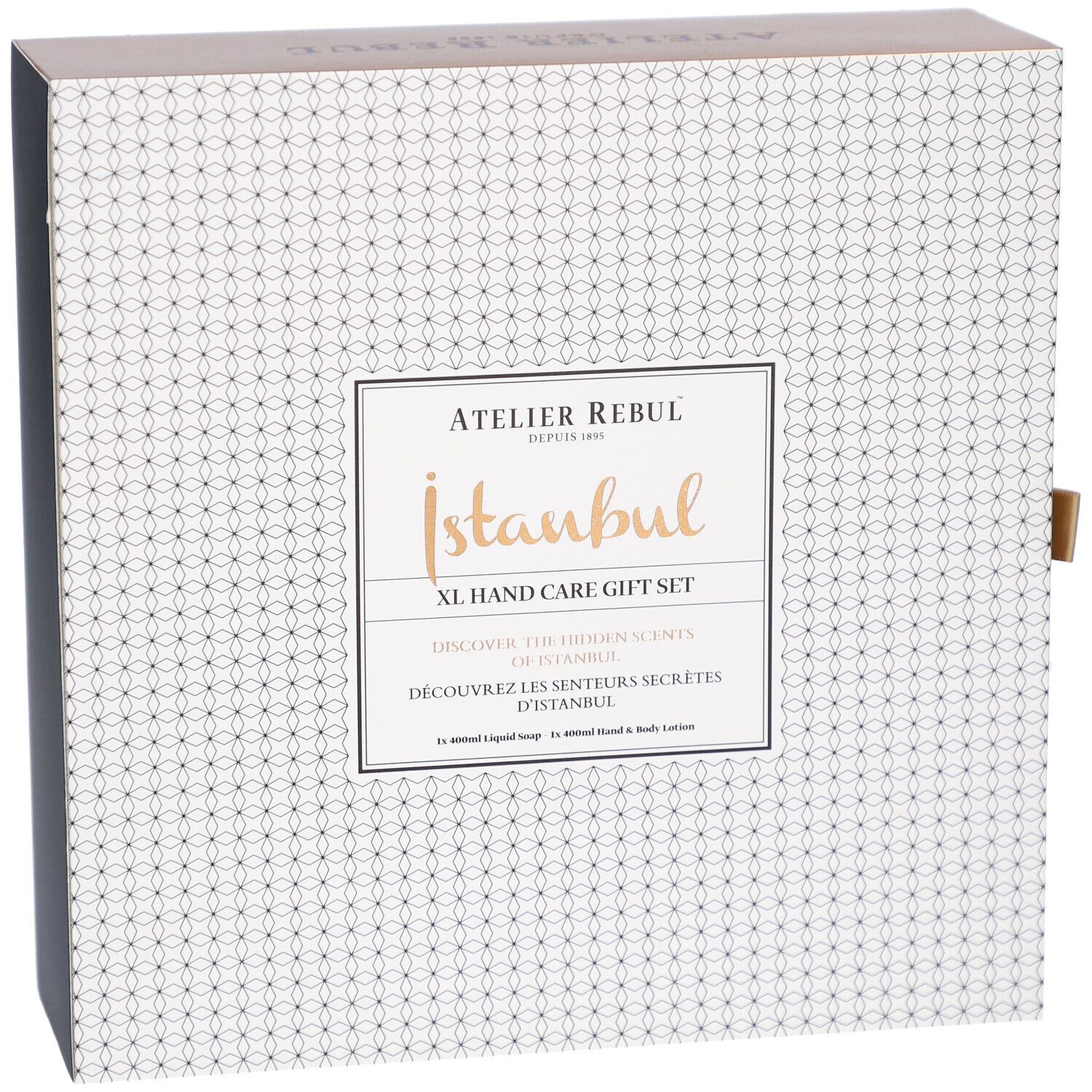 Geschenkset-Box mit weißem Muster und schwarzer Seite. Aufschrift: Atelier Rebul Istanbul XL Hand Care Gift Set.