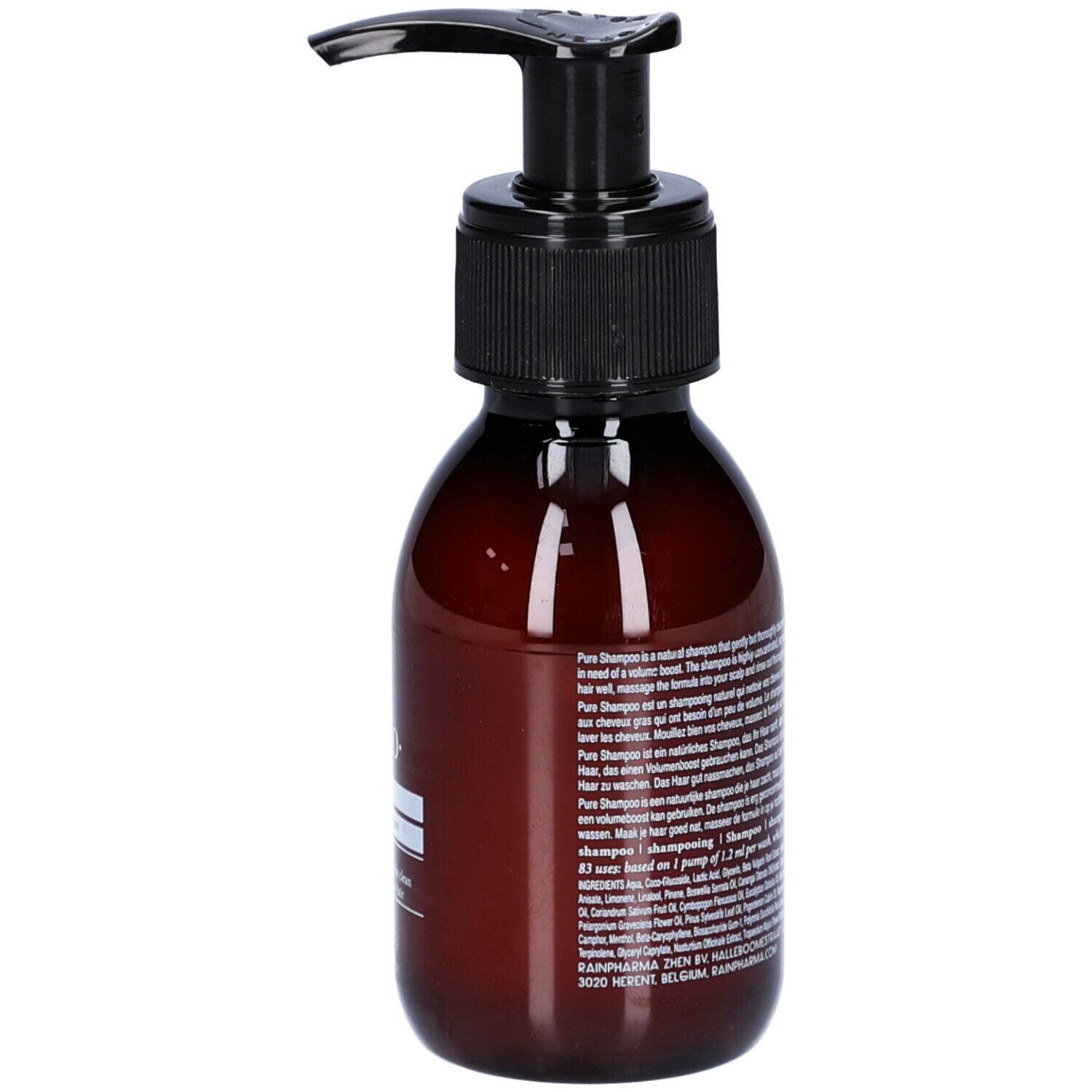 Braune Flasche mit schwarzem Pumpkopf. Aufschrift: Pure Shampoo. Text in mehreren Sprachen. Etikett mit Produktinformationen.