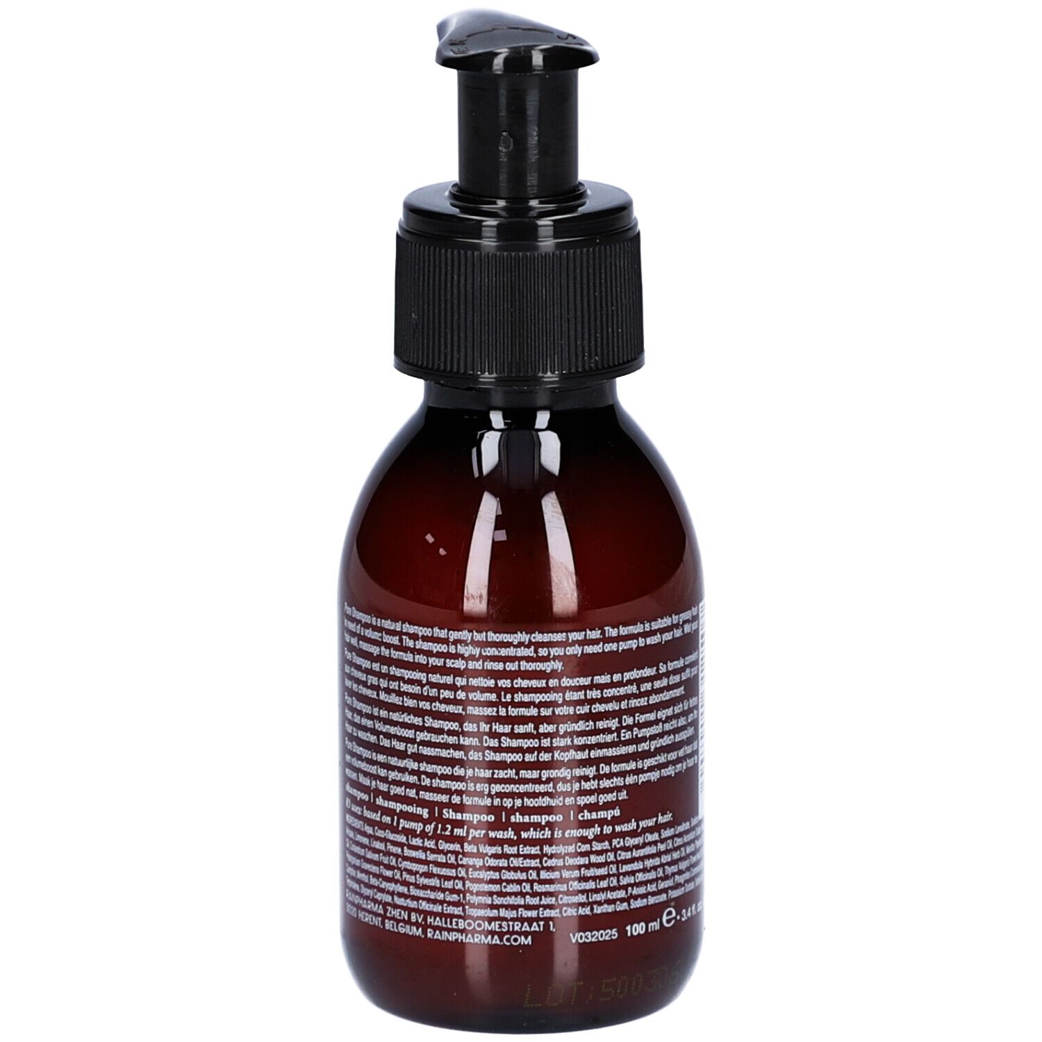 Braune Flasche mit schwarzem Pumpkopf. Aufschrift: Pure Shampoo. Text in mehreren Sprachen. Etikett mit Produktinformationen.