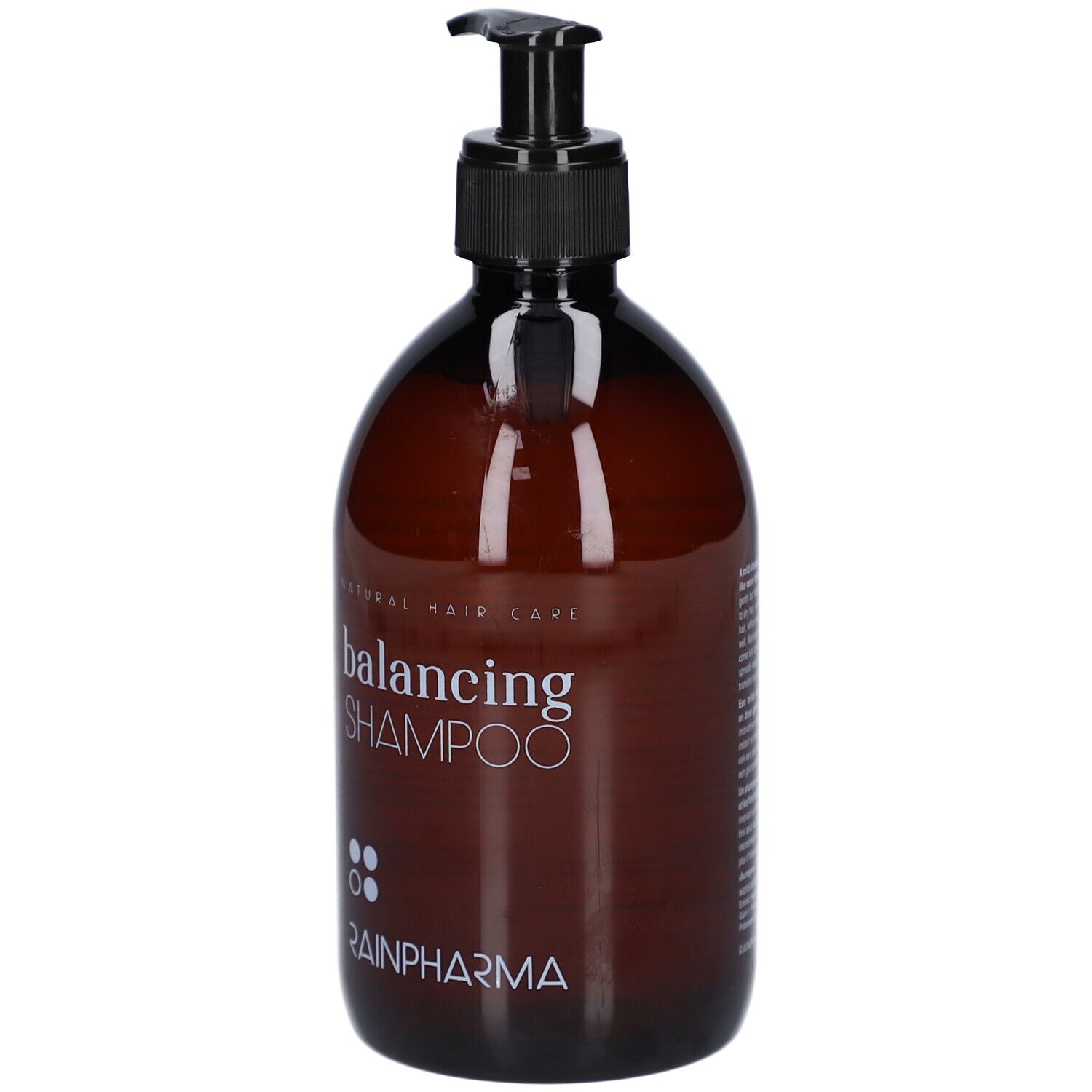 Braune Flasche mit schwarzem Pumpverschluss. Aufschrift: balancing SHAMPOO, RainPharma. Natürliche Haarpflege.