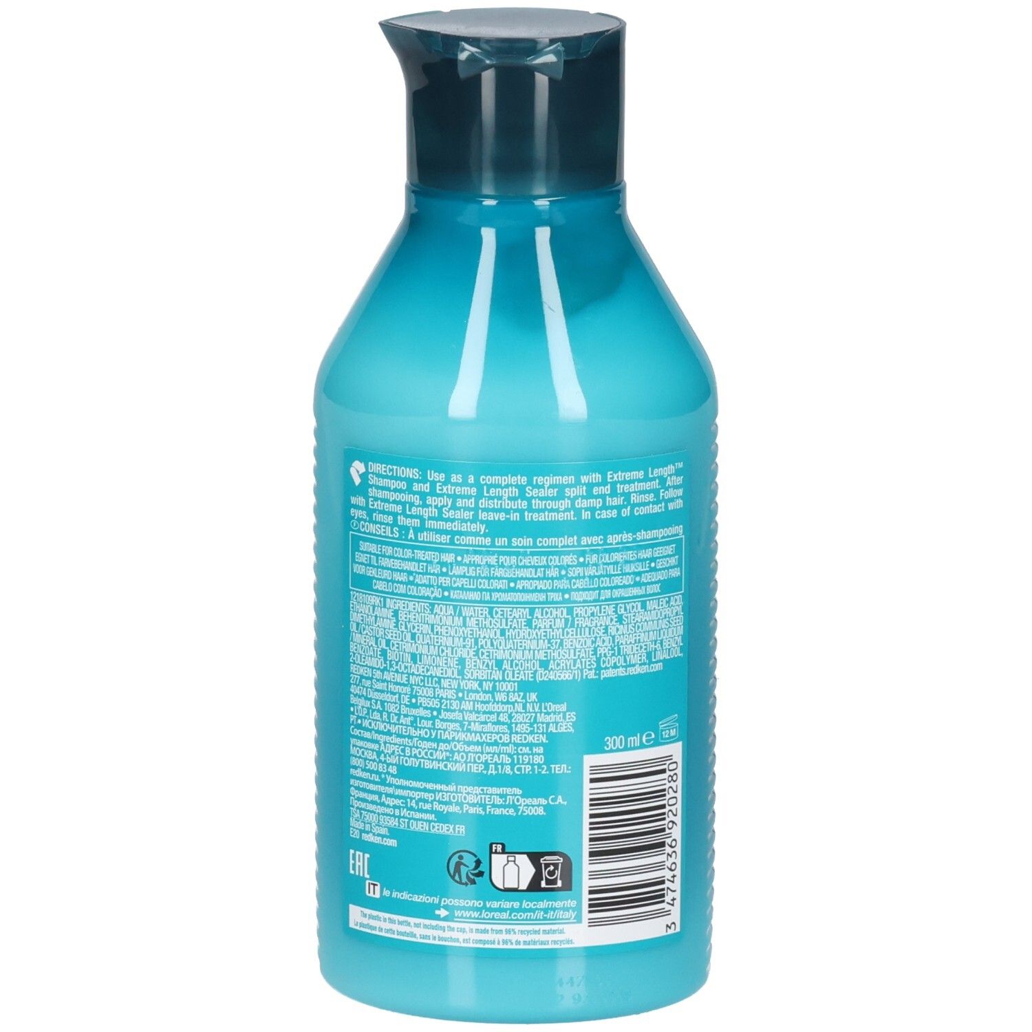 Türkise Shampooflasche mit dunkelblauem Verschluss. Rückseite mit Etikett und Barcode.