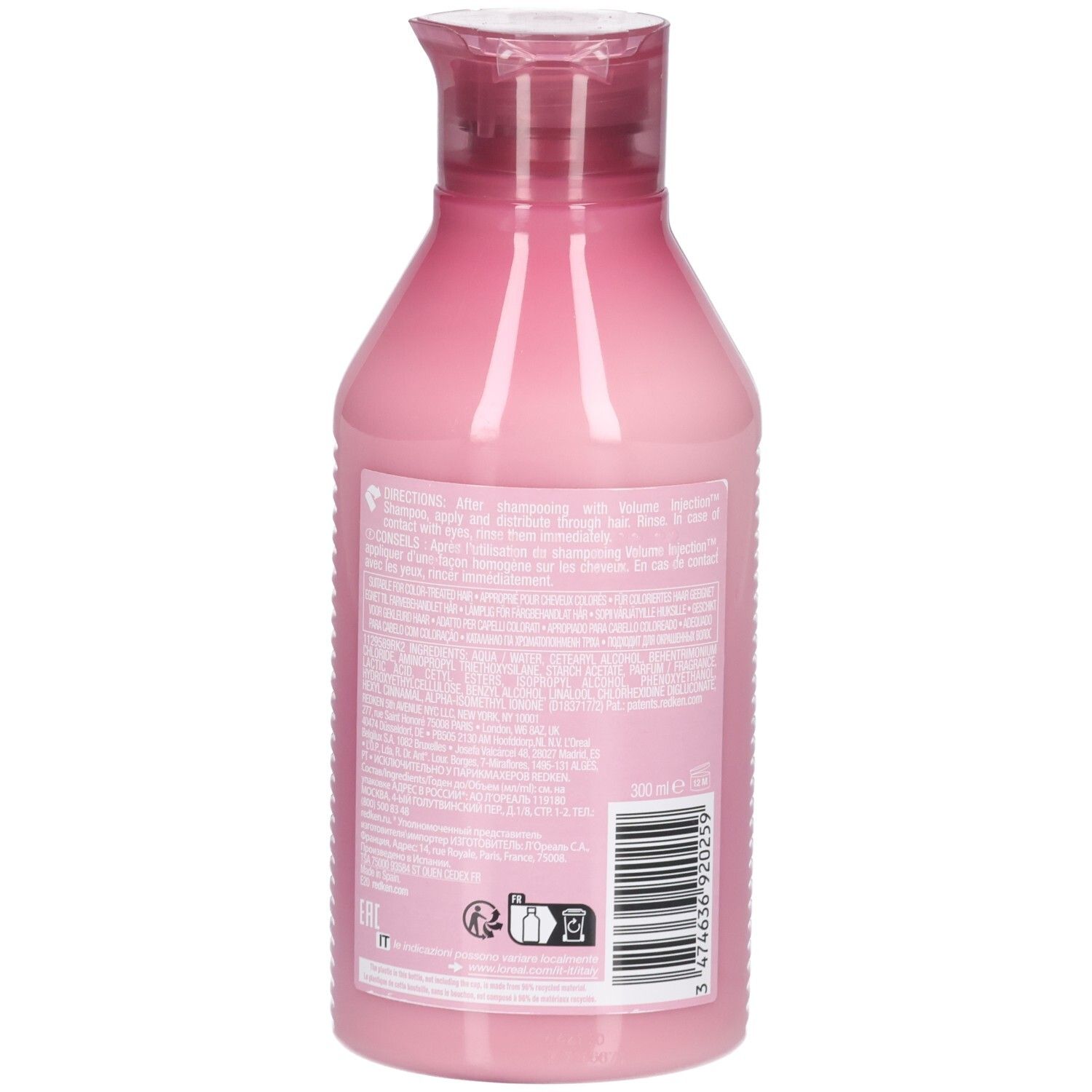 Rückansicht einer rosa Flasche mit rotem Deckel. Auf der Rückseite befinden sich Text, ein Barcode und Symbole.