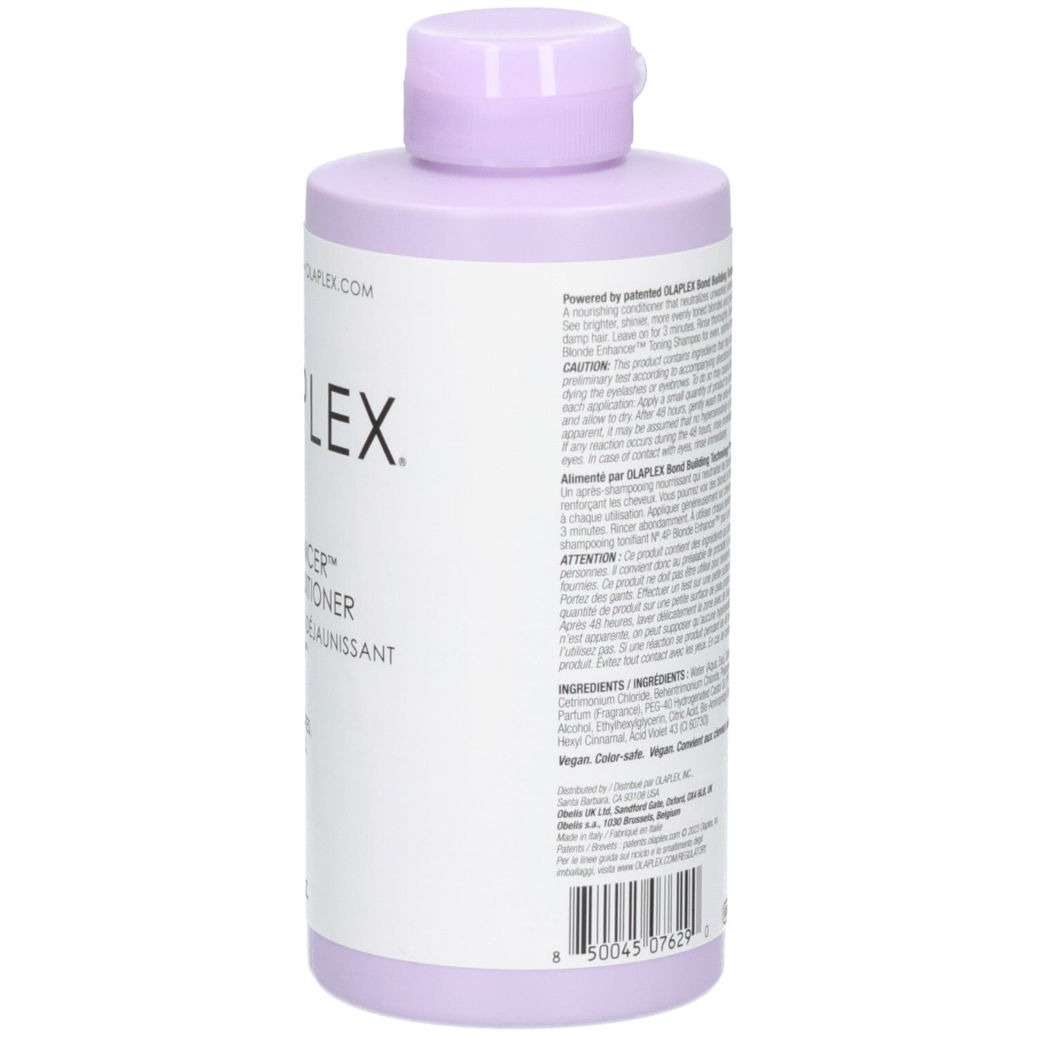Bouteille de revitalisant lilas clair avec inscription noire et bouchon rabattable violet.