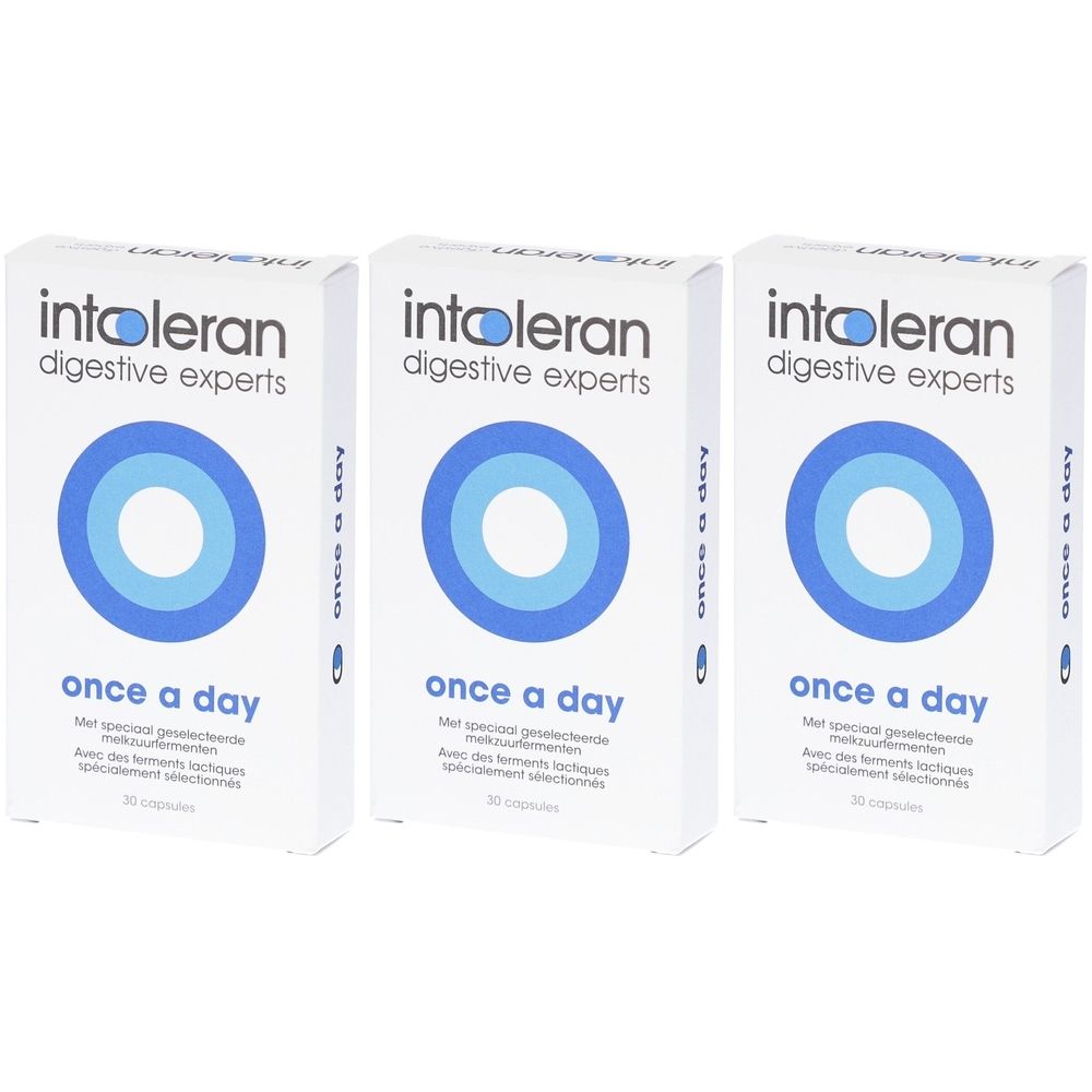Drie witte dozen met de productnaam en de tekst "once a day". Blauwe cirkels op de voorkant. Tekst in het Duits, Nederlands en Frans.