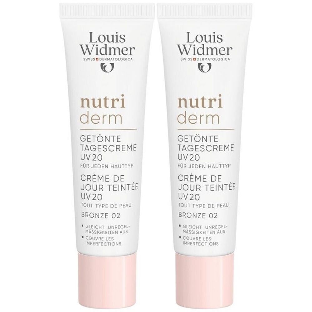 Twee tubes Louis Widmer Nutriderm Getönte Dagcrème UV20 Bronze 02. Witte tubes met tekst en roze dop.