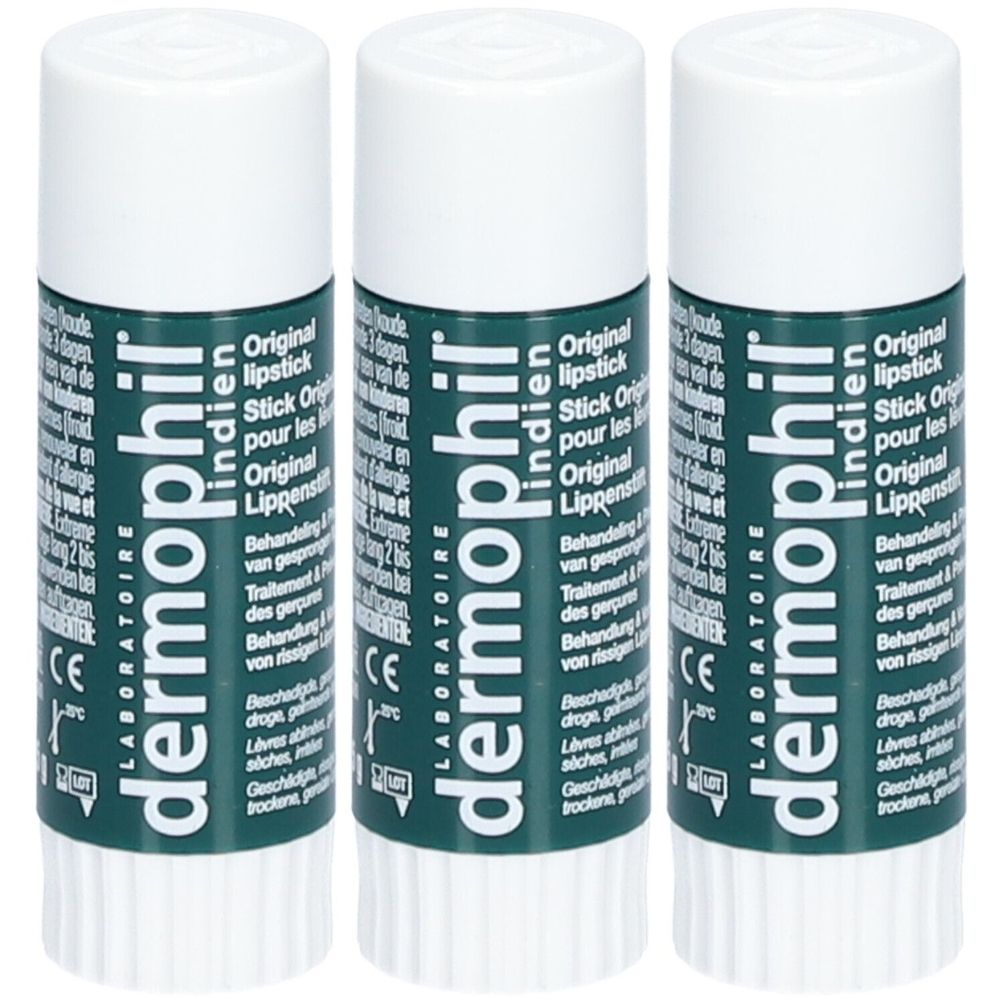 Trois sticks pour les lèvres avec bouchon blanc. Étui vert imprimé avec le texte "Dermophil Indien".