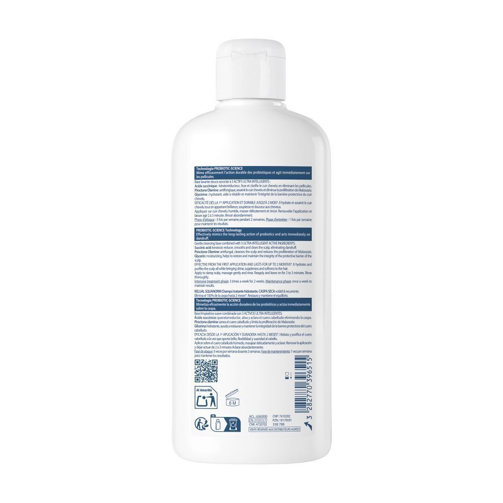 Dos d'un flacon de shampooing. Texte multilingue. Code QR et symboles.
