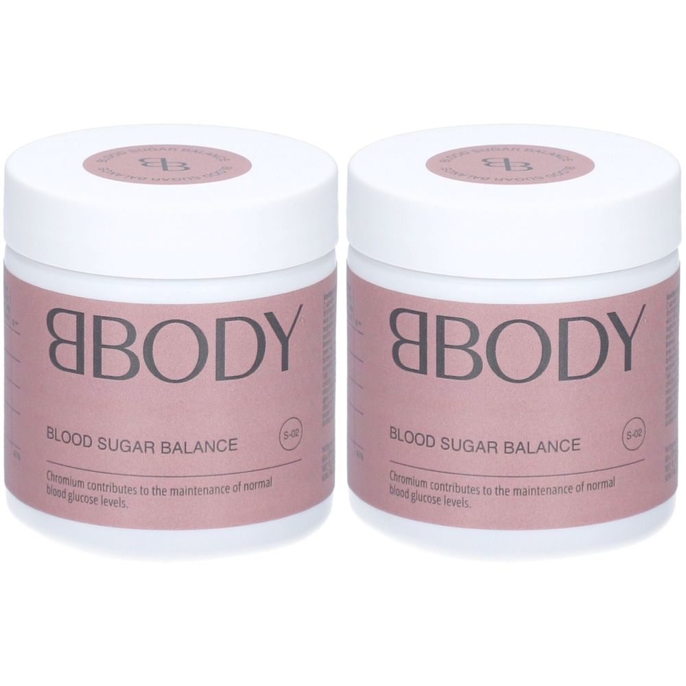 Twee witte potten met roze etiketten. Opschrift: BBODY, bloedsuikerbalans. Voedingswaardetabel.