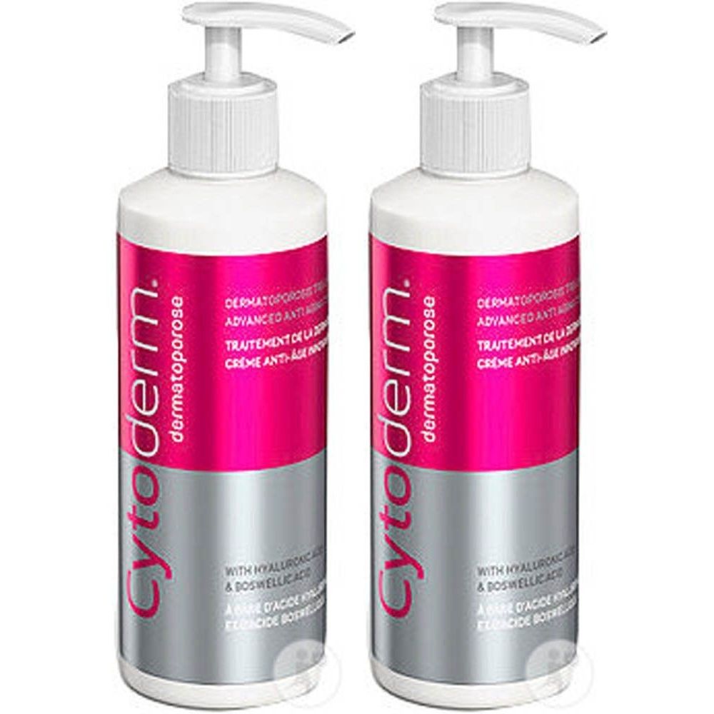 Twee flessen Cytoderm Dermatoporose crème met doseerpomp. Roze-zilveren etiketten met productinformatie.
