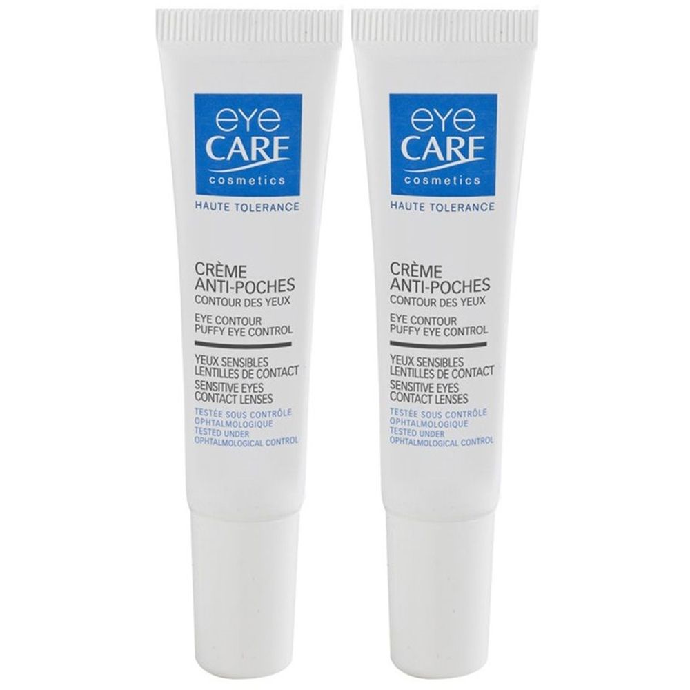 Twee witte tubes oogcrème. Blauwe logo's "eye CARE cosmetics". Tekst: Crème Anti-Poches, Eye Contour, Sensitive Eyes. Getest onder controle.