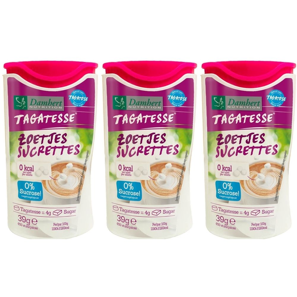 Drie containers Damhert Tagatesse zoetstof. Rode deksel, witte container met paars etiket. Tekst: Zoetjes Sucrettes, 0% Sucrosel.