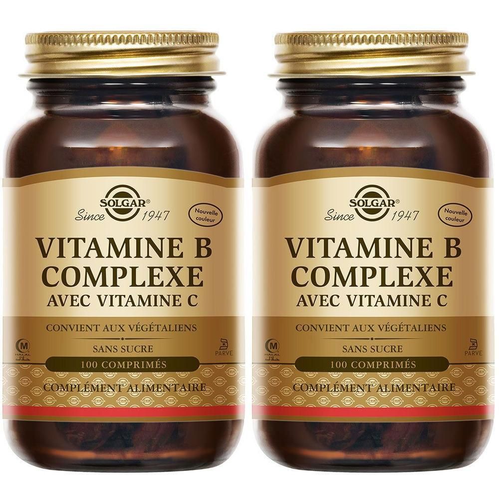 Deux flacons en verre brun avec bouchons dorés. Inscription: Vitamin B Complexe avec Vitamine C, 100 comprimés. Marque: Solgar.