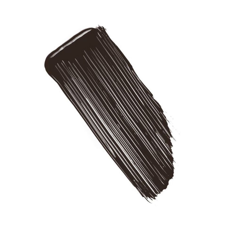 Dunkelbrauner Mascara-Strich auf weißem Hintergrund. Textur sichtbar.