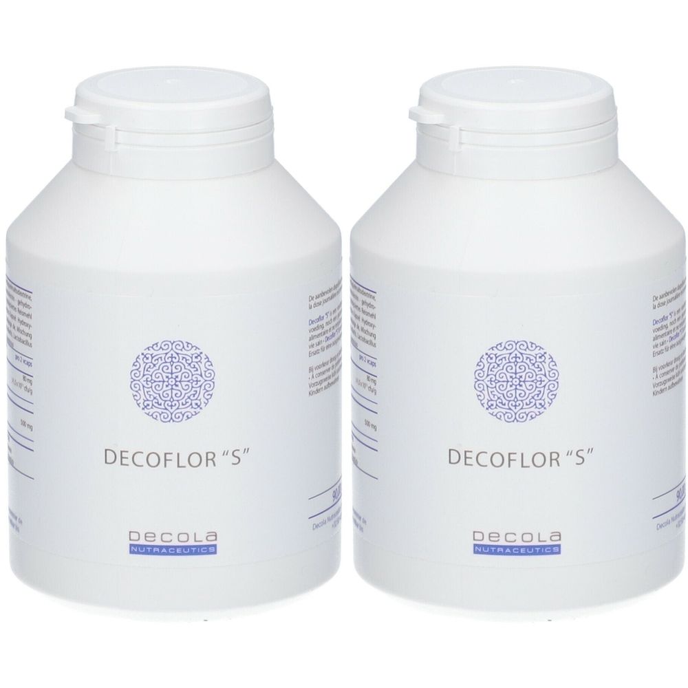Twee witte flessen met deksels. Opschrift: Decoflor "S" en Decola Nutraceutics. Labels met tekst.