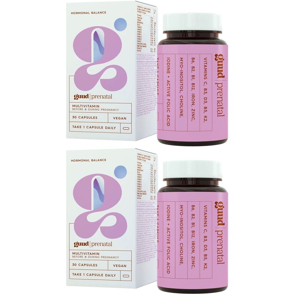 Twee verpakkingen "guud prenatal" met flessen en dozen. Flessen met opschrift: vitaminen, "Iodine + Active Folic Acid".