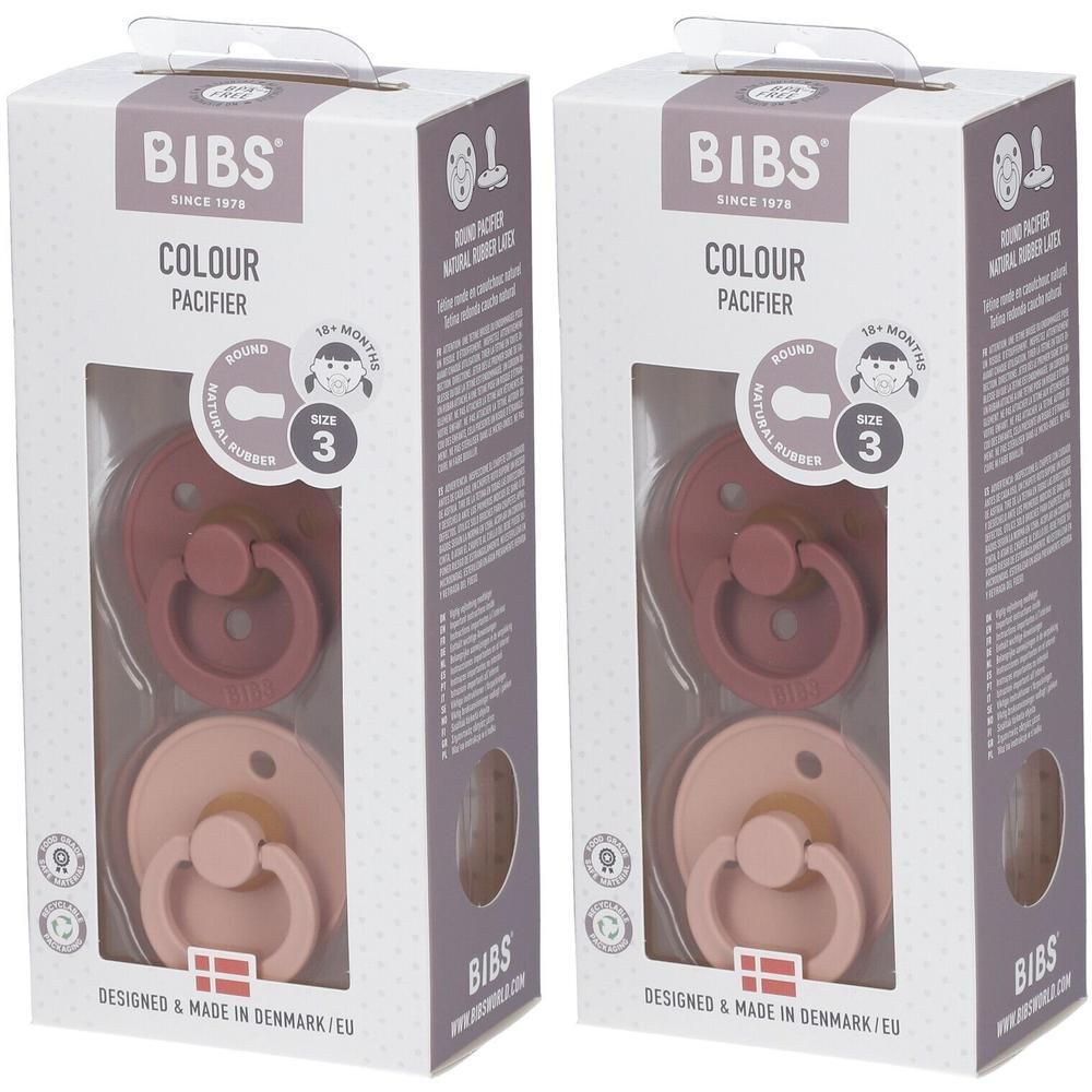 Zwei BIBS COULEUR Schnuller in Verpackung. Größe 3, rosa und braun. Sichtfenster, Markenlogo, dänisches Design.