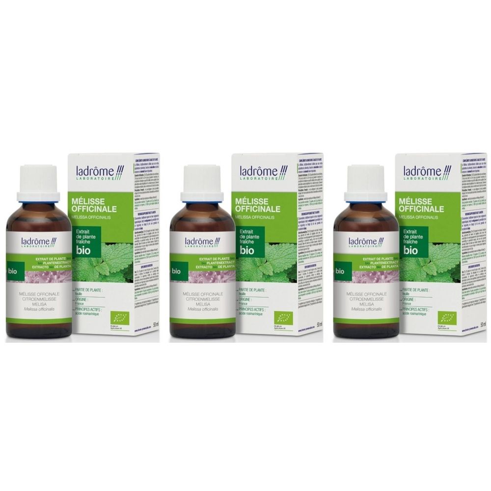 Drie flessen Ladrôme Extrait de plante fraîche Mélisse officinale met verpakking. Bruine glazen flessen, witte doppen, groene etiketten.