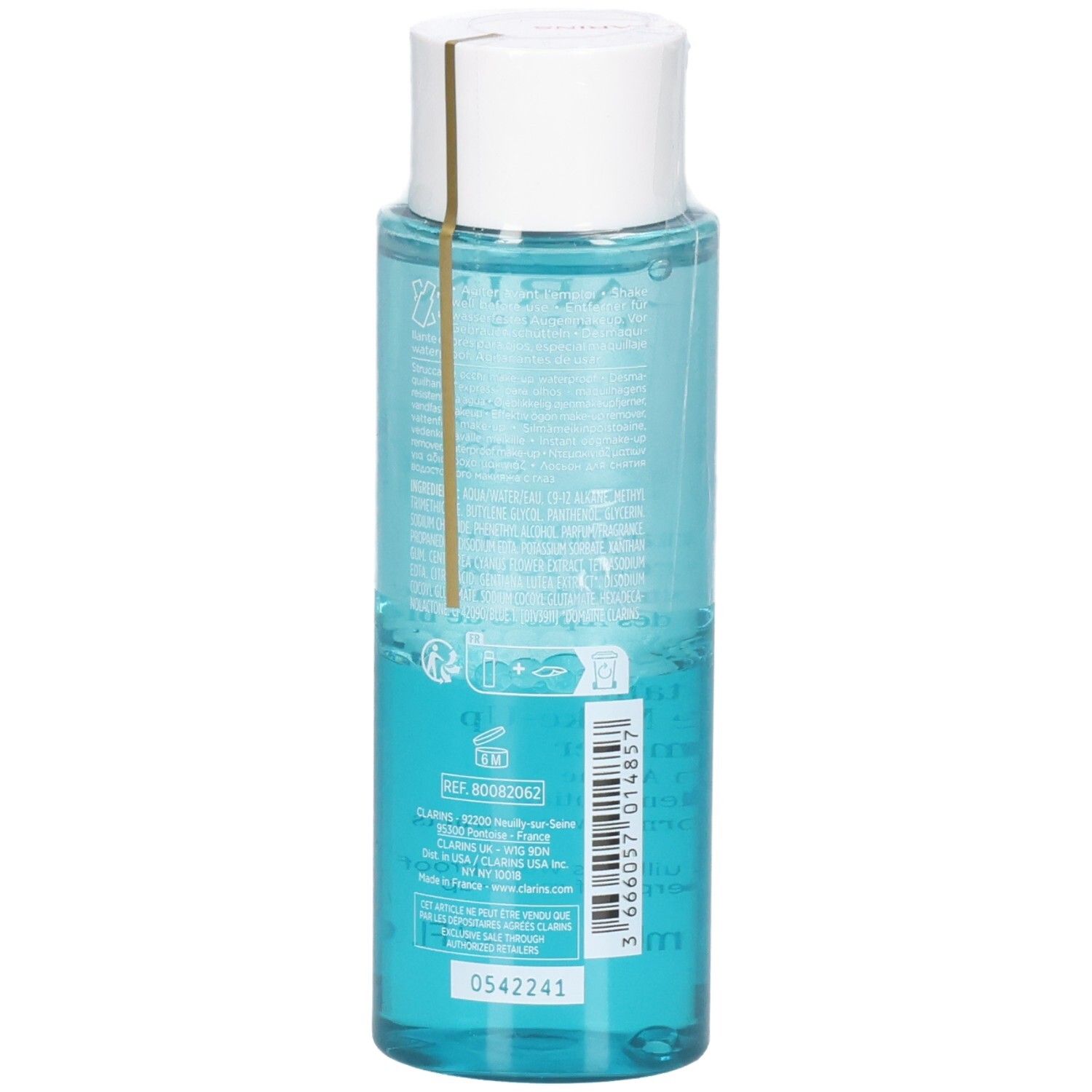 Liquido blu chiaro in una bottiglia trasparente con tappo bianco e nastro dorato.