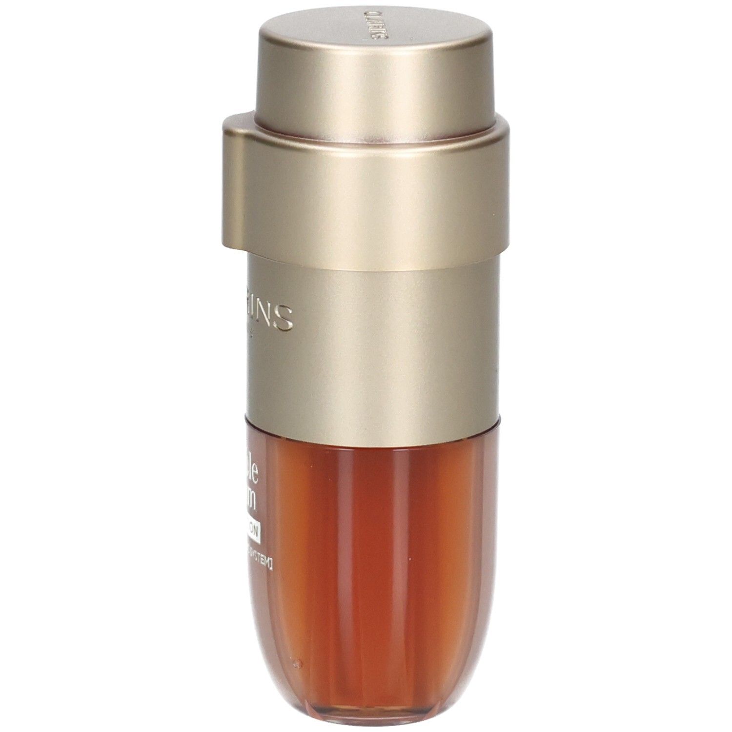 Doppelseitige Foundation-Flasche mit goldfarbenem Spender und braunem Inhalt.