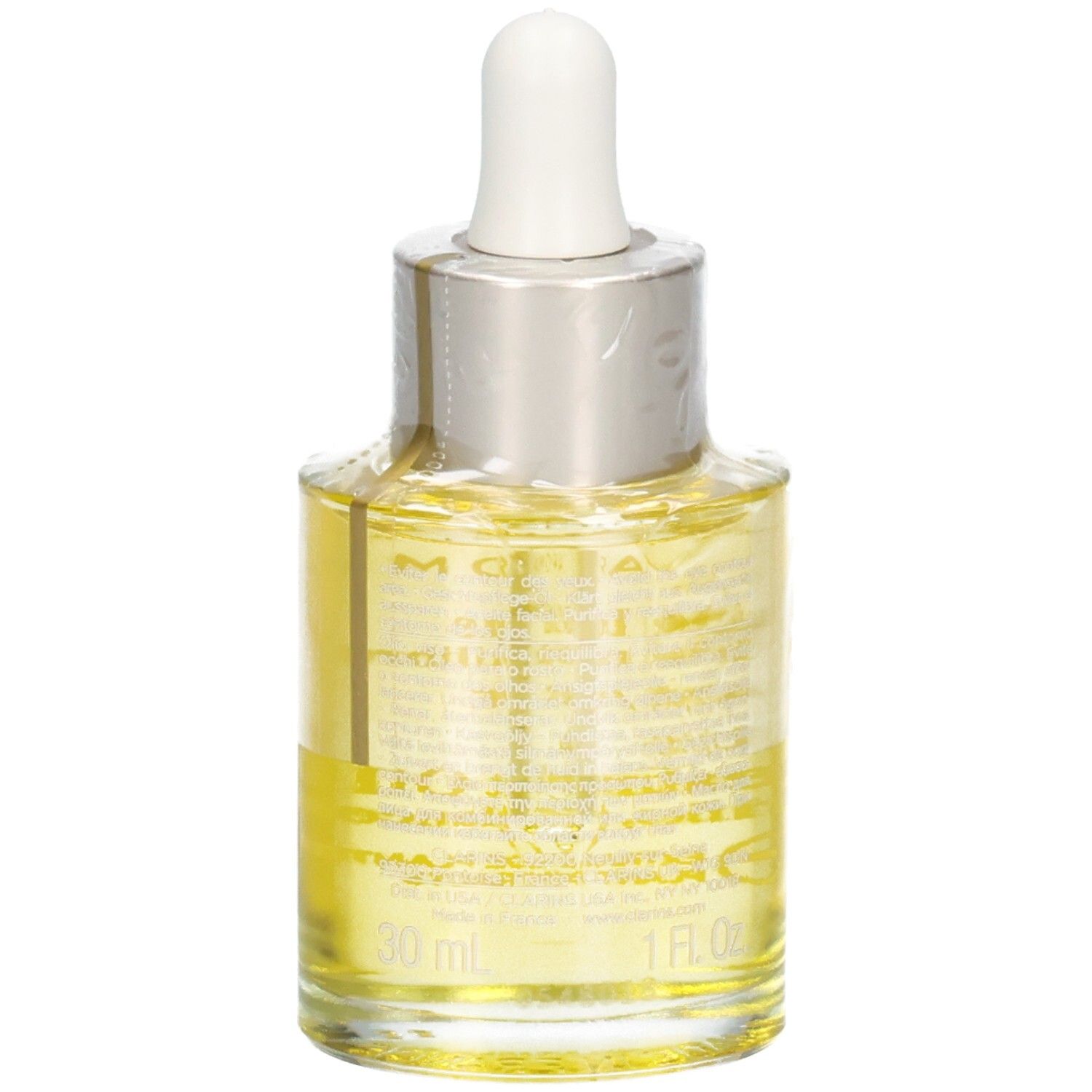 Clarins Aroma Huile Lotus Gesichtsöl, 30 ml. Gelbe Flüssigkeit in Glasflasche mit Pipette.