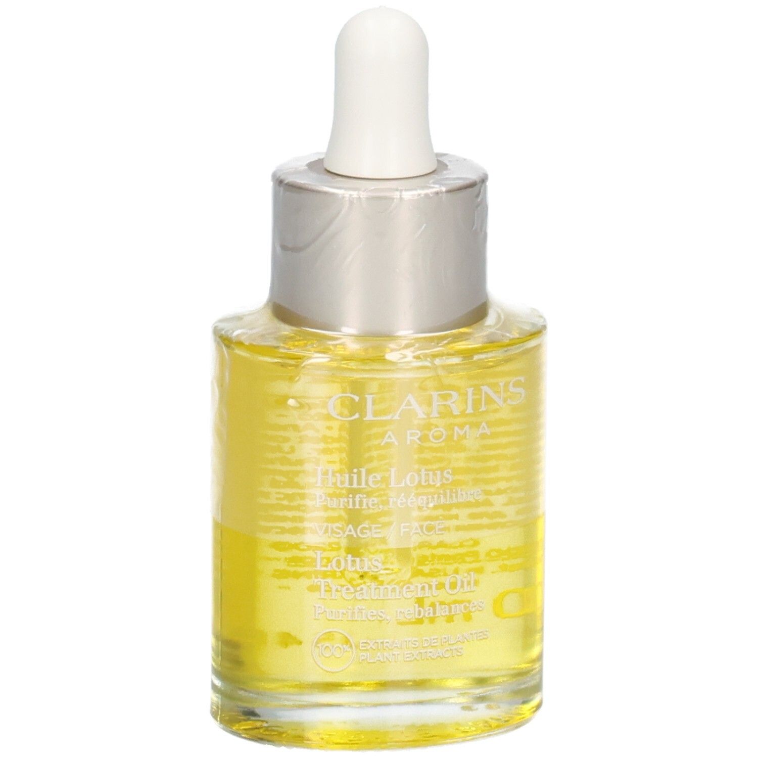Clarins Aroma Huile Lotus Gesichtsöl. Gelbe Flüssigkeit in Glasflasche mit Pipette, mit Text.
