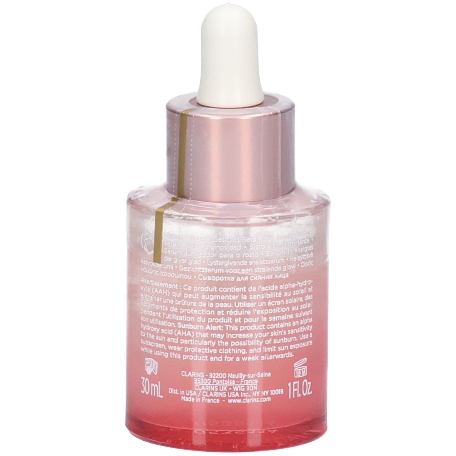 Clarins Multi Active Glow Serum Flasche mit Pipette, rosa-getöntes Glas, Rückseitenansicht mit Text.