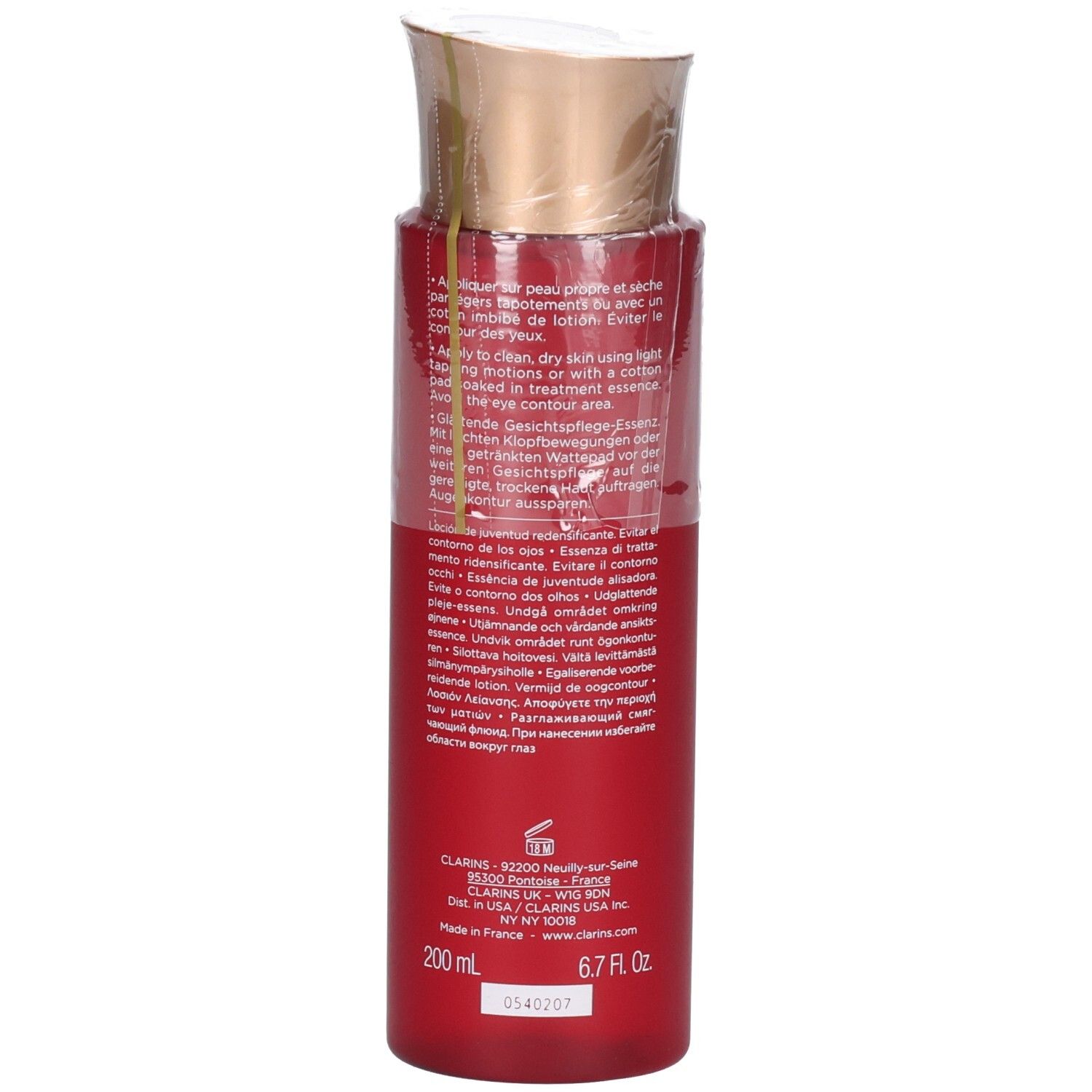 Clarins Multi-Intensive Behandlung Essence Flasche, Rückseite mit detaillierten Anwendungshinweisen.