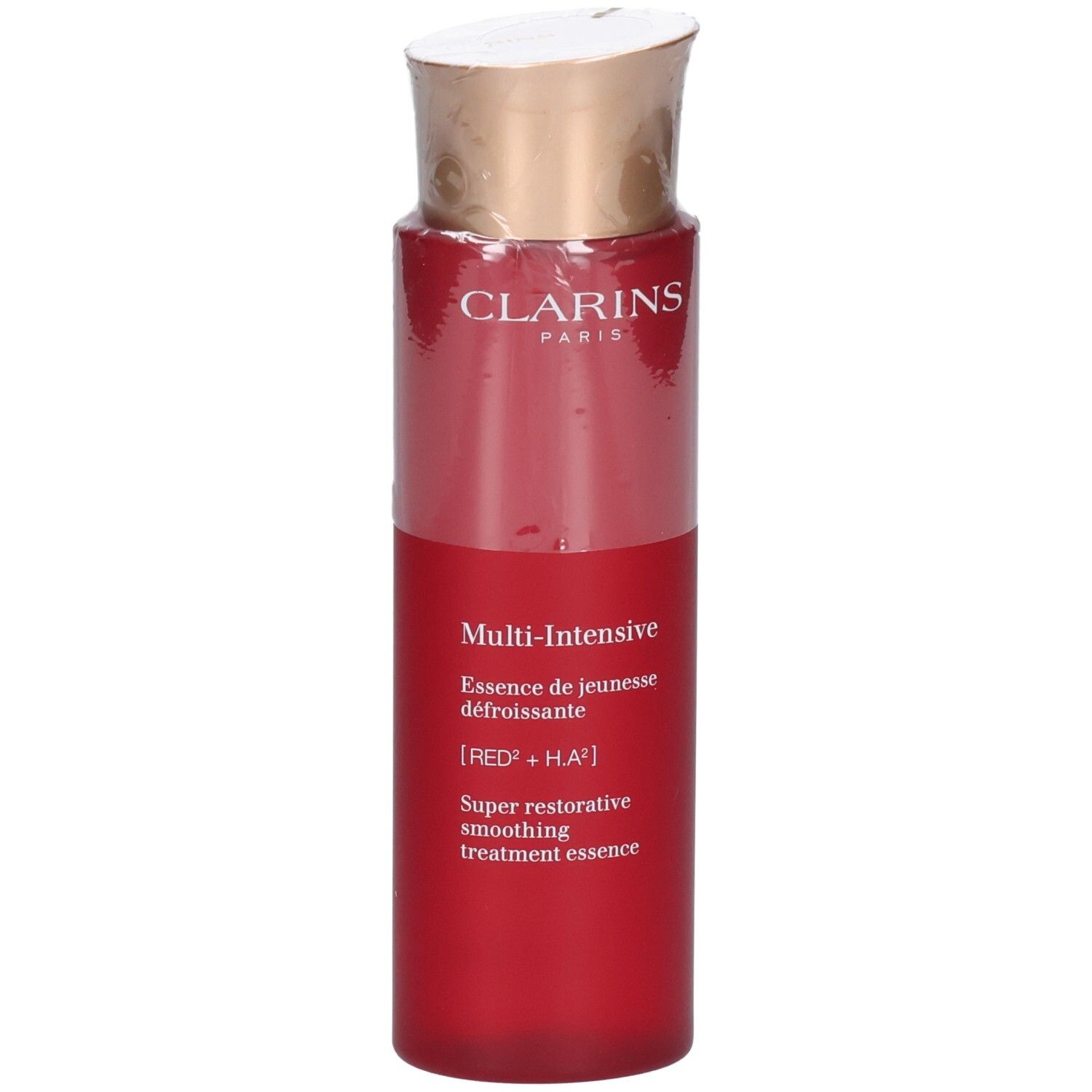 Clarins Multi-Intensive Behandlung Essence Flasche mit rotem Körper und goldenem Verschluss.