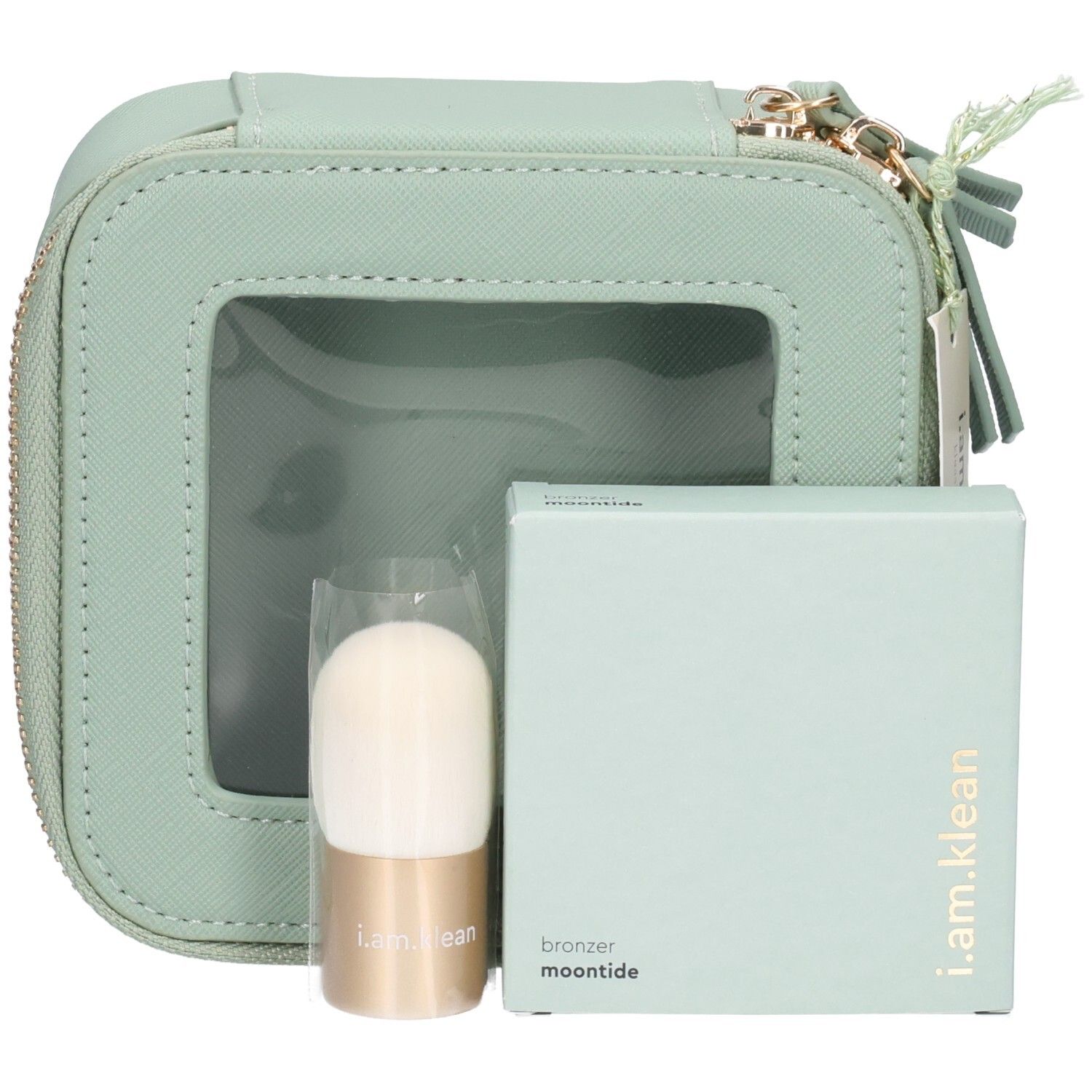 Hellgrüne Kosmetiktasche mit Pinsel und Puder. Puderbox mit Aufschrift bronzer moontide. Label: i.am.klean.