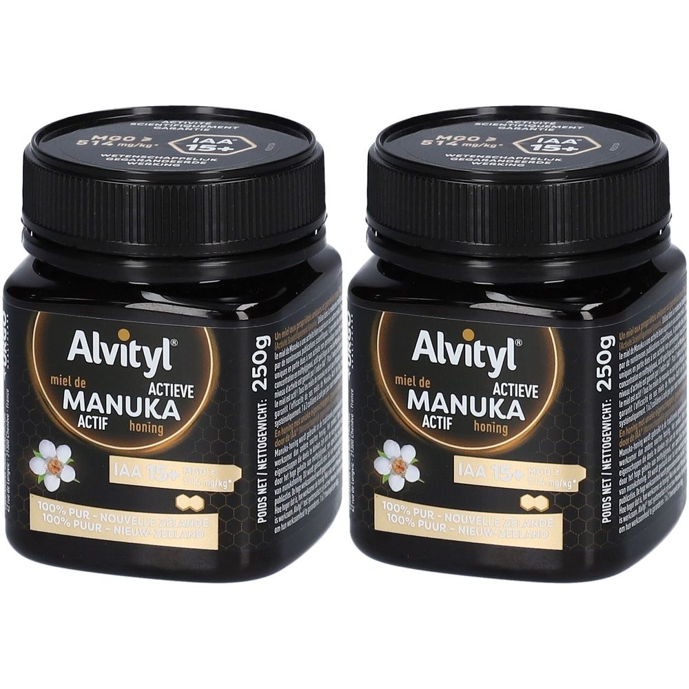 Twee zwarte potten met label "Alvityl Miel de Manuka ACTIF". IAA 15+ zegel. 250g. Honingpotten.