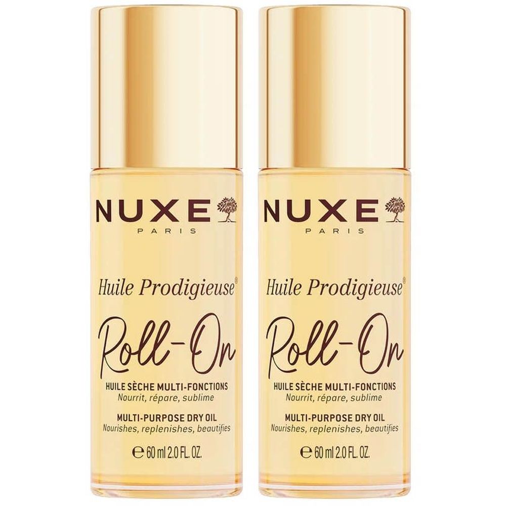 Twee flacons Nuxe Huile Prodigieuse Roll-On. Gouden doppen, transparante flacons met gele vloeistof. Tekst: Nuxe, Huile Prodigieuse.