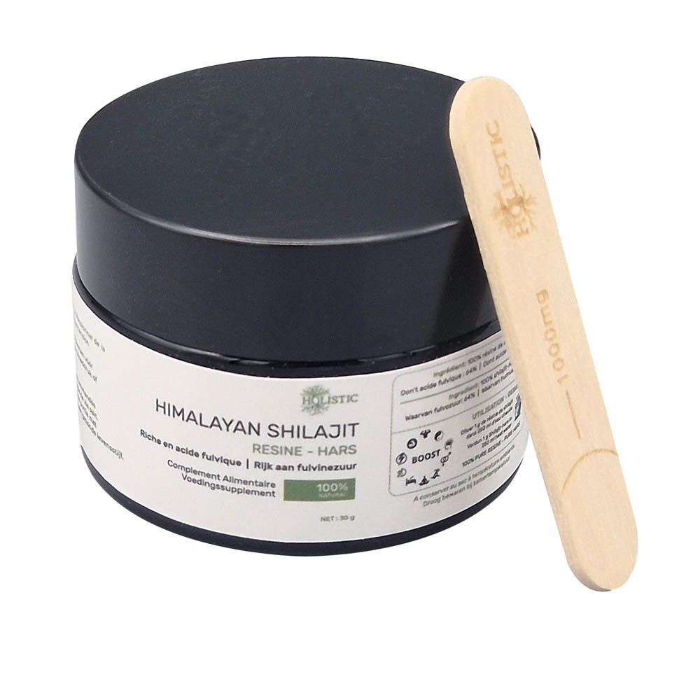 Pot noir avec étiquette blanche et spatule en bois. Inscription: Himalayan Shilajit Résine. Vert: 100%.