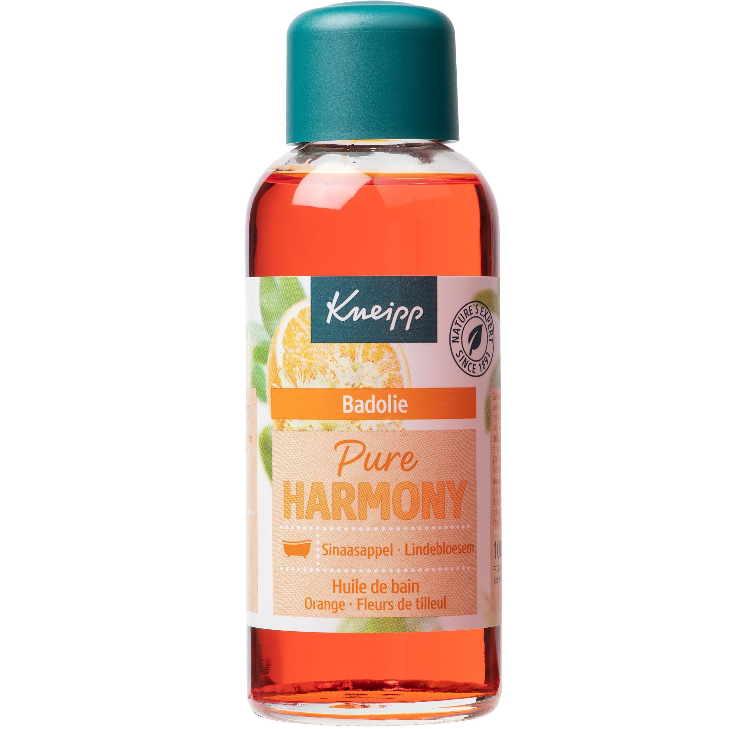 Transparante fles met oranje olie en groene dop. Etiket met productnaam en logo.