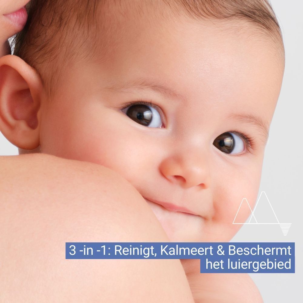Baby in close-up. Tekst: 3-in-1: Reinigt, Kalmeert & Beschermt het luiergebied.