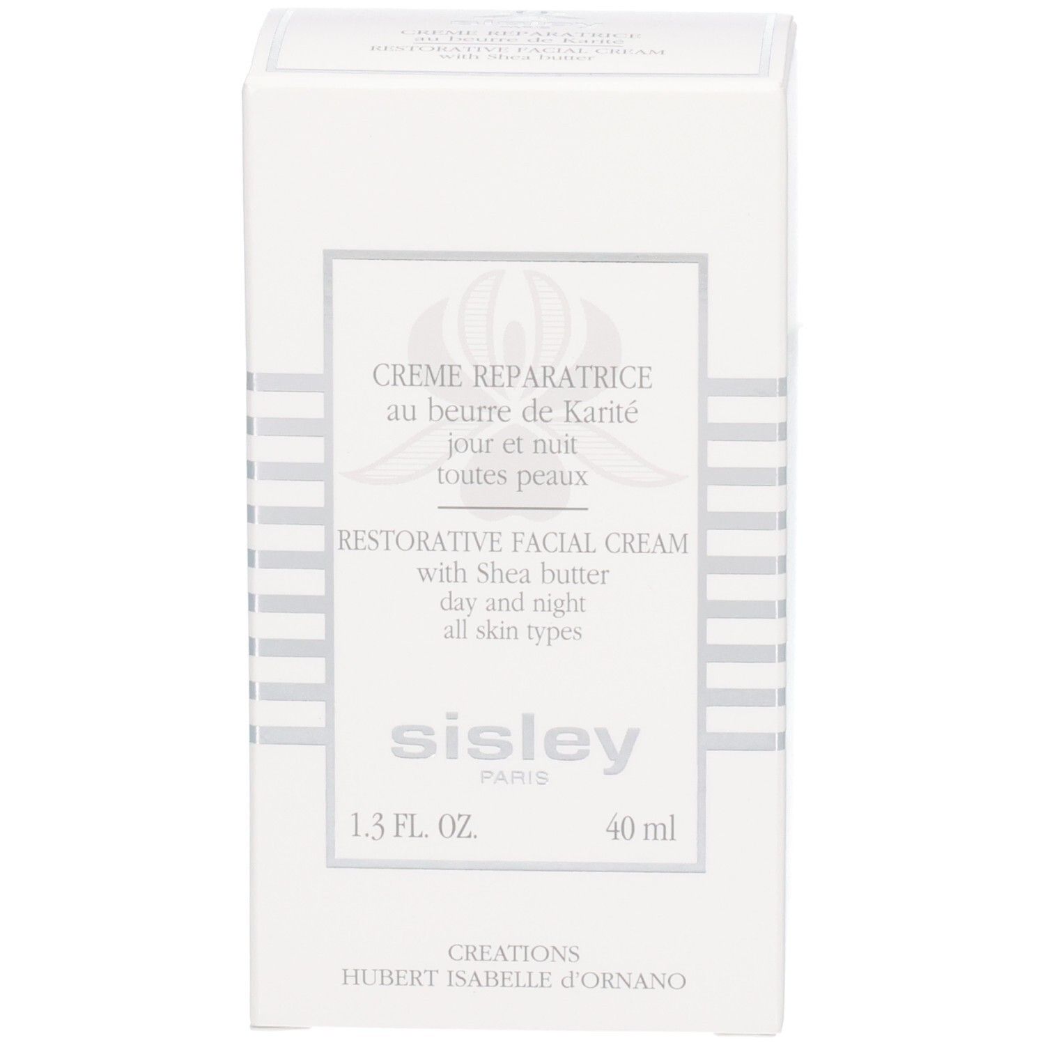 Sisley Creme Reparatrice Umverpackung. Weiße Kartonage mit silbernen Linien und Produktinformationen.