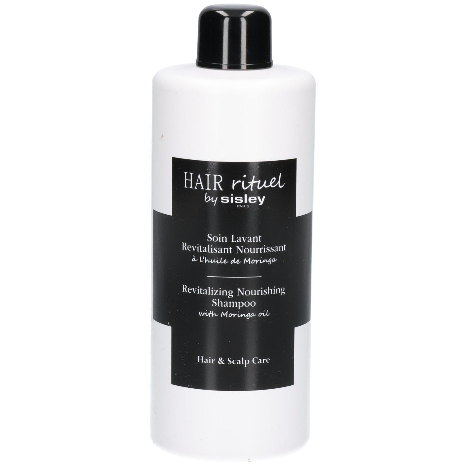 Weiße Flasche mit schwarzem Etikett: Revitalizing Nourishing Shampoo.