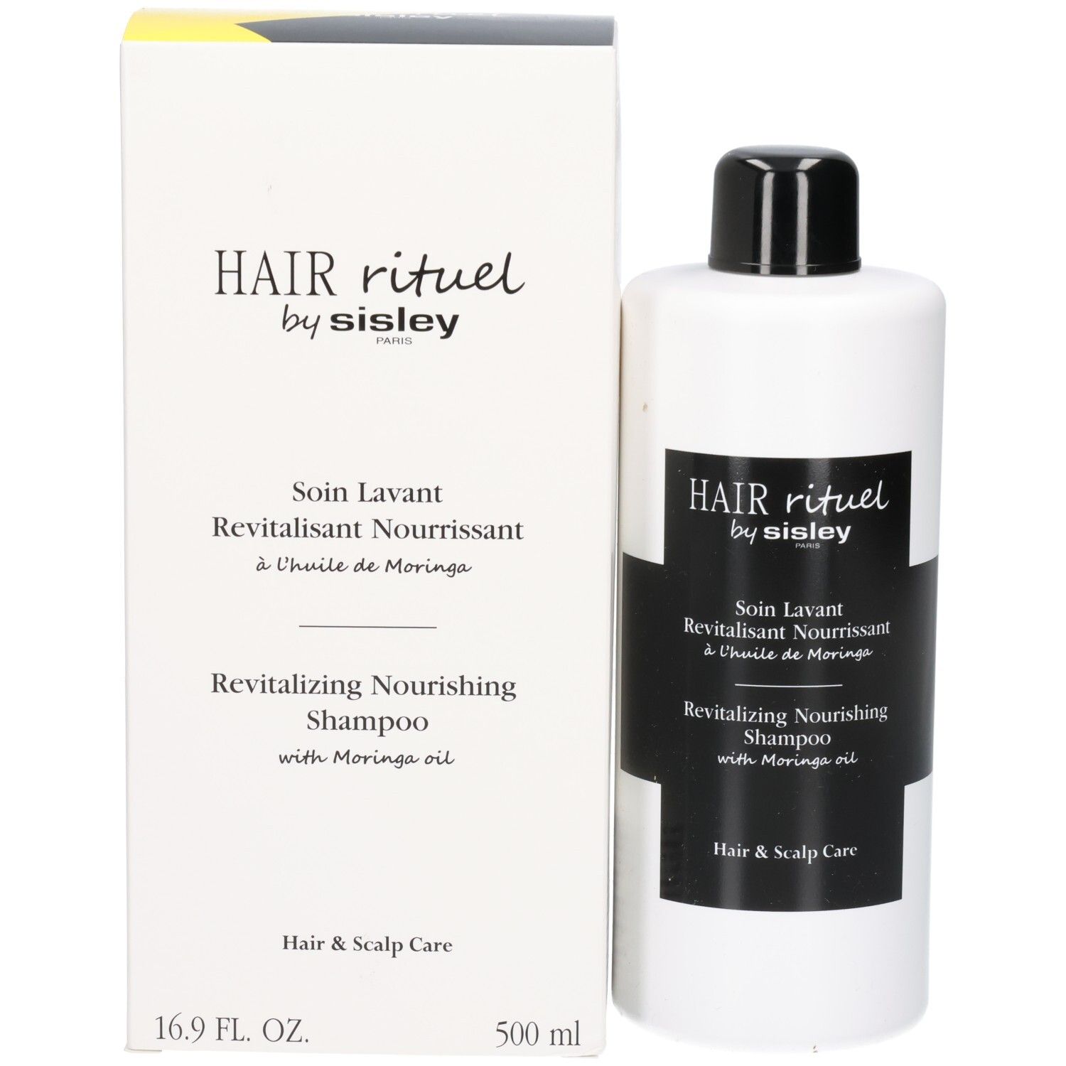 Weiße Flasche und Verpackung mit schwarzem Etikett: Revitalizing Nourishing Shampoo.