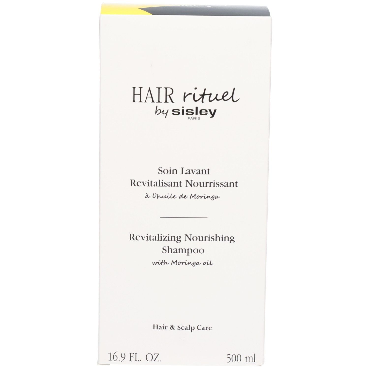 Weiße Verpackung mit schwarzem Etikett: Revitalizing Nourishing Shampoo, 500 ml.