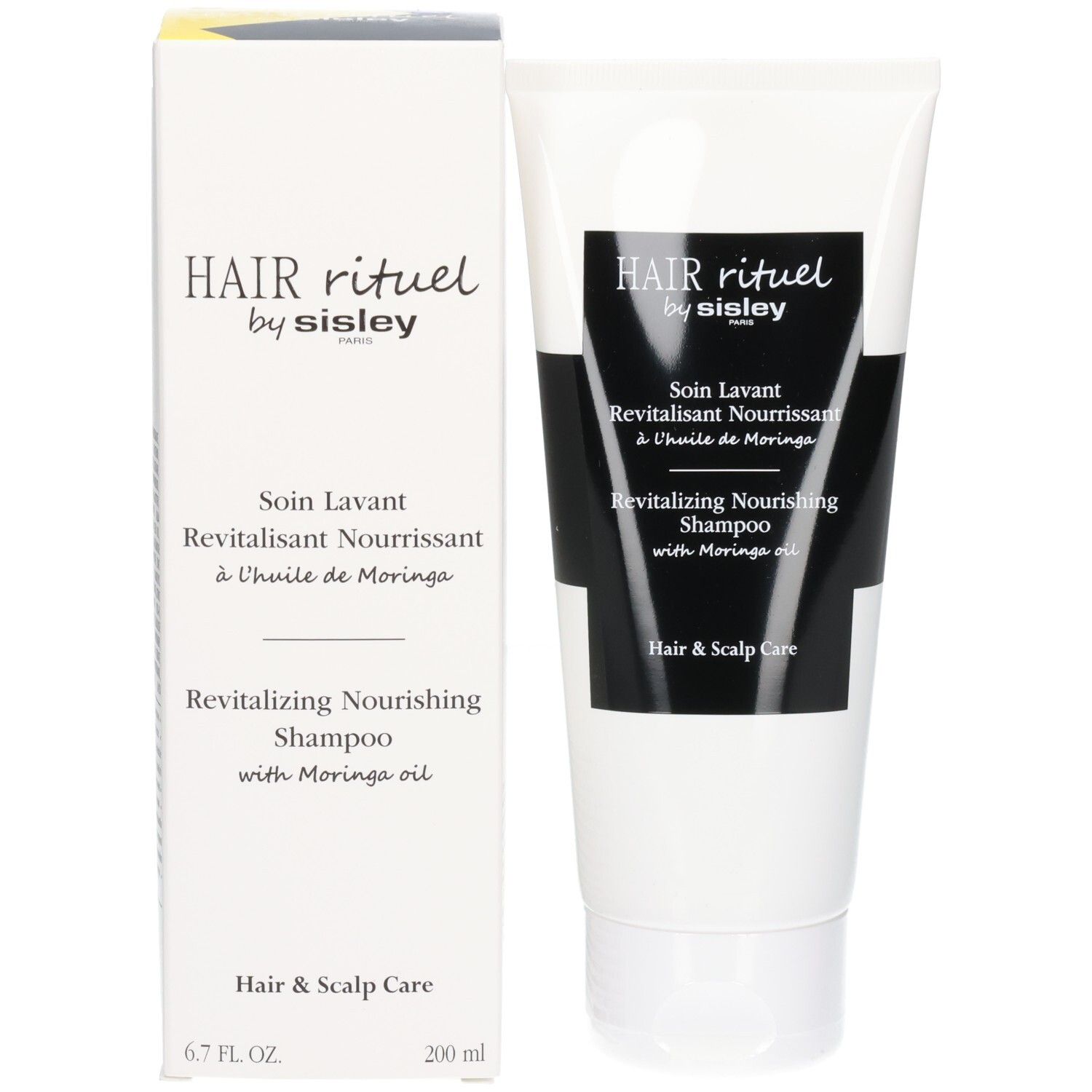 Tube und Kartonverpackung des Revitalizing Nourishing Shampoo von Hair Rituel by Sisley.
