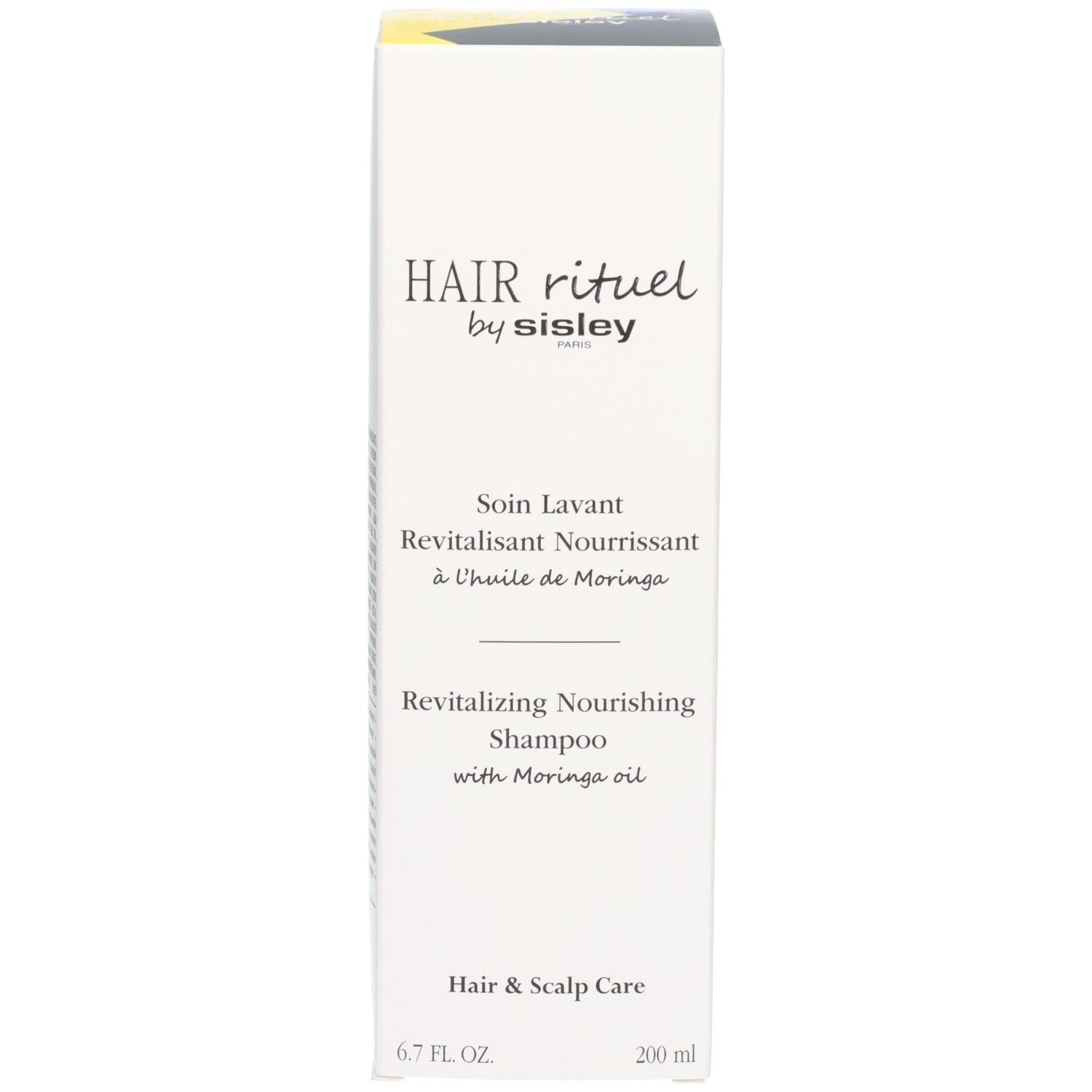 Kartonverpackung des Revitalizing Nourishing Shampoo von Hair Rituel by Sisley.