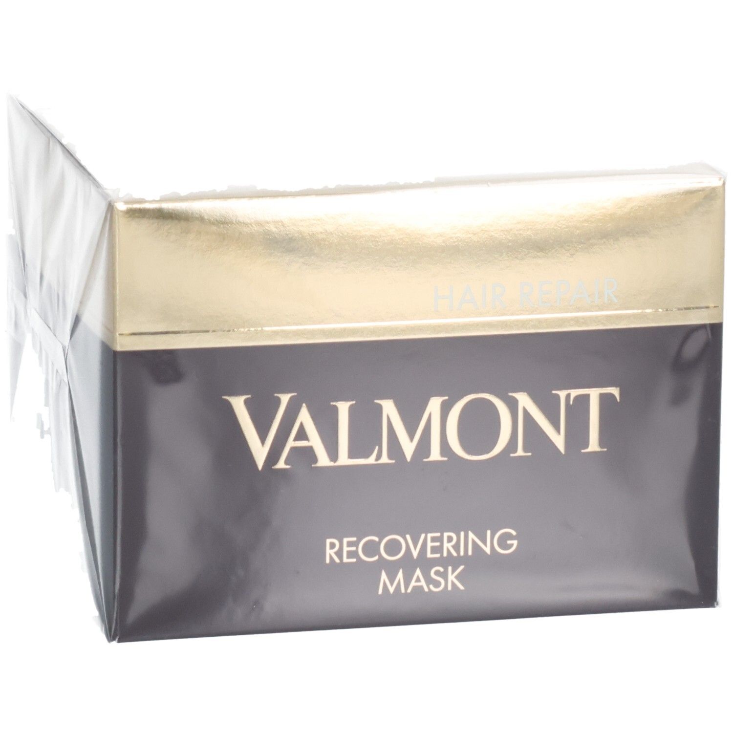 Valmont Recovering Mask Haarmaske, dunkle Verpackung mit goldenen Akzenten, leicht schräg.