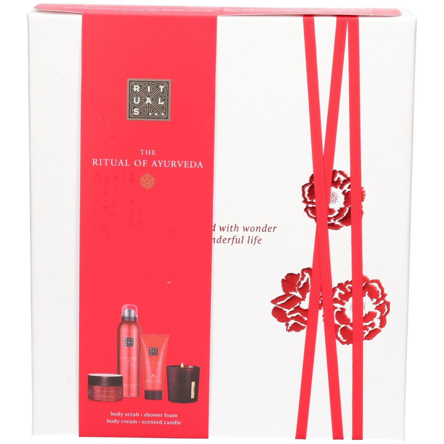 Coffret cadeau RITUALS The Ritual of Ayurveda : face avant de la boîte blanche avec ruban rouge, fleurs et illustrations de produits.