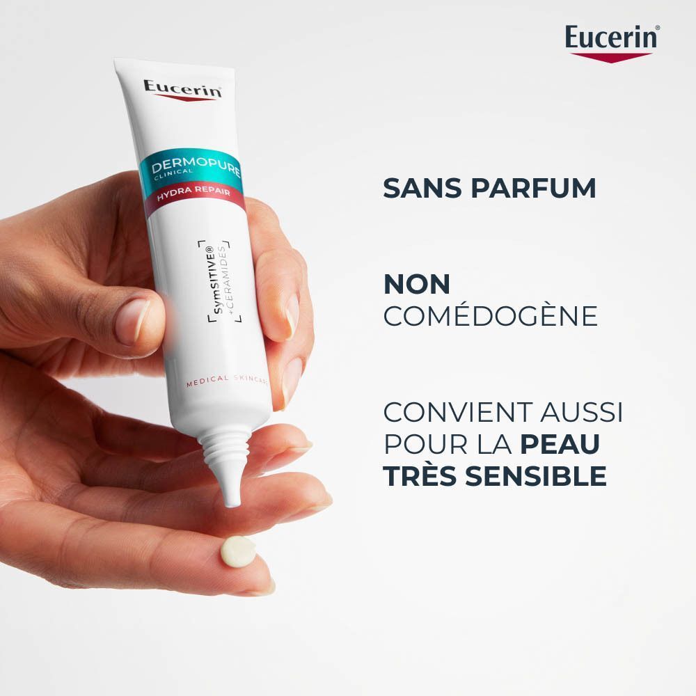Texte : Avec SymSITIVE™ apaisant. Régule la sensibilité de la peau. Apaise les sensations de démangeaison et de brûlure.