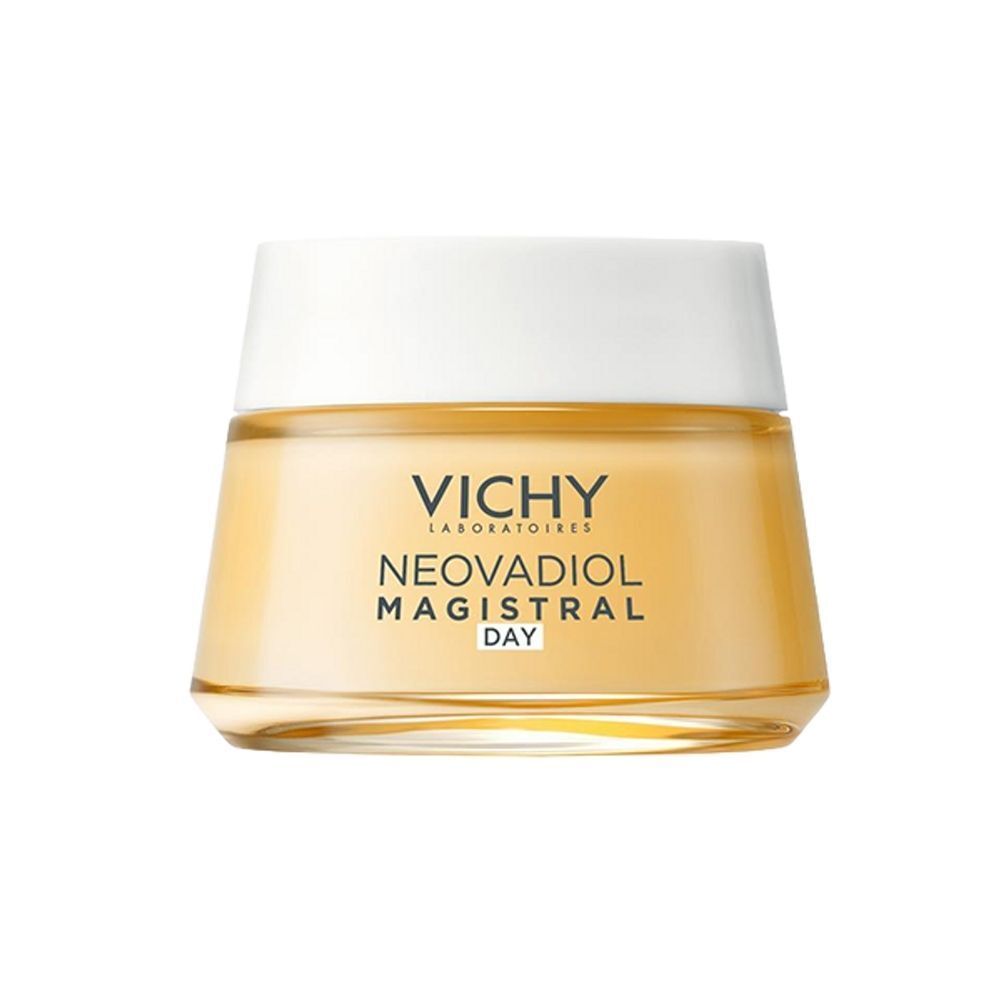 Pot de crème Vichy Neovadiol Magistral Day. Crème jaune en pot de verre, couvercle blanc.